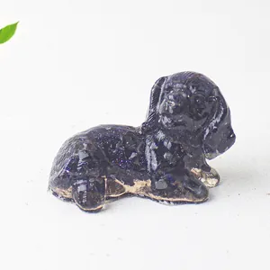 Macro shot of blue goldstone puppy figurine with shimmering star-like details