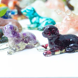 Macro detail of dog resin figurines filled with colorful natural crystal gemstones
