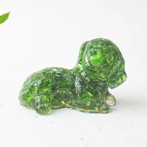 Detail of a green crystal resin dog figurine with sparkling internal crushed stone texture