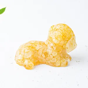 Top view of a small yellow dog ornament crafted from natural crystal stone and resin