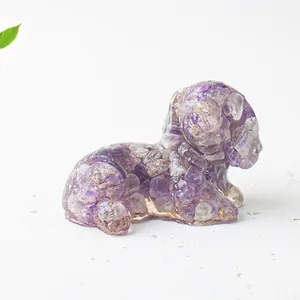 Detail of a dog-shaped crystal resin ornament with purple stones for desk decor