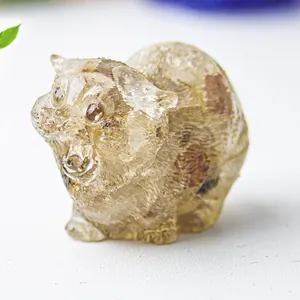 Macro view of a cat resin statue with natural smoky quartz crystal texture and carving