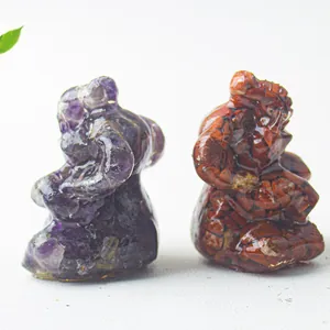 Natural crystal gravel Ganesha elephant statues in purple and reddish brown resin