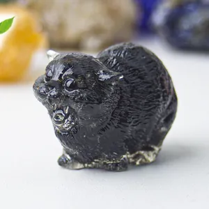 Detailed close-up of a black crystal resin cat figurine with realistic fur textures