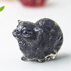 Detailed macro view of black crystal cat figurine with fine fur texture and vocalizing pose
