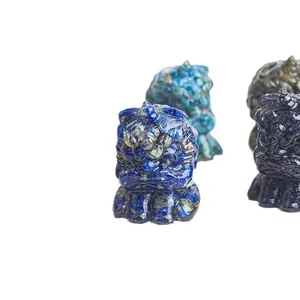Deep blue lapis lazuli stone lion sculpture with natural mineral textures on white background