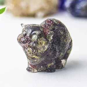 Detailed close-up of a resin cat figurine with natural crystal stone texture and fur detail