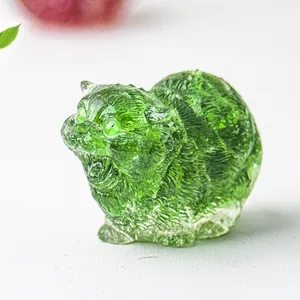 Macro detail of a green translucent crystal cat figurine with fine fur texture carvings