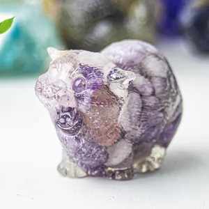 Macro shot of purple amethyst crystal resin cat ornament with detailed fur texture