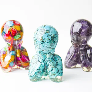 Three-piece octopus statues made of clear resin and colorful natural crystal stones