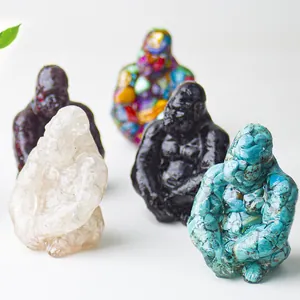 Detail view of gorilla statues in resin and crystal with various textures and colors