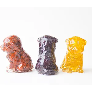Three crystal resin dog statues in red, purple, and yellow for home desk decoration