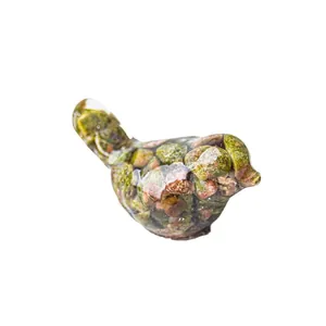 Artistic bird statue made of clear resin and natural green crystal stones for home decor