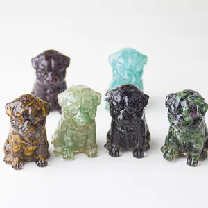 Macro detail of Pug resin figurines with natural crystal stones and smooth glossy finish