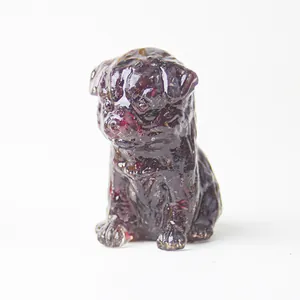 Pug dog miniature figurine crafted from deep red resin and natural crystal stones