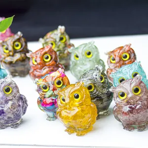 Vibrant resin owl figurines with colorful natural crystals and vivid yellow eyes