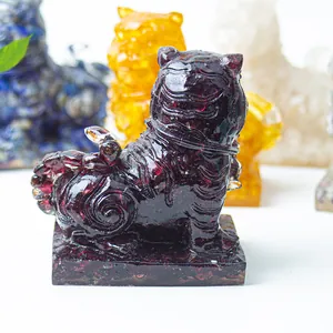 Macro view of a resin crystal tiger statue with purple gemstone fill for home office decor