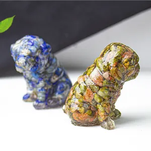 Macro shot of resin dog statues filled with crushed colorful natural gemstones