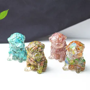 Detail of four colorful resin puppy figurines with crushed gemstone mosaic texture