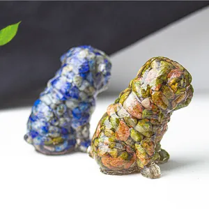 Detailed close-up of resin dog figurines made of colorful natural crushed stone and resin