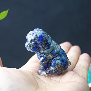 Detailed blue resin shar pei dog figurine with stone texture held in hand for scale