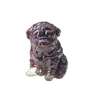 Artistic resin Pug dog figurine with realistic wrinkle textures in deep red finish