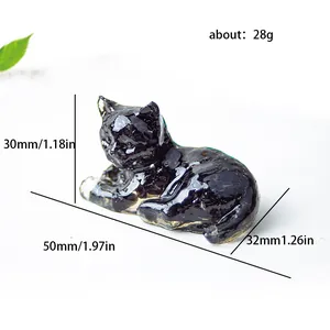 Gepolijst zwart hars kattenbeeldje met kristallen, afmetingen 50x32x30mm
