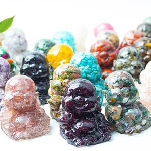 Detailed macro of Laughing Buddha statues made of colorful resin and natural crystal stones