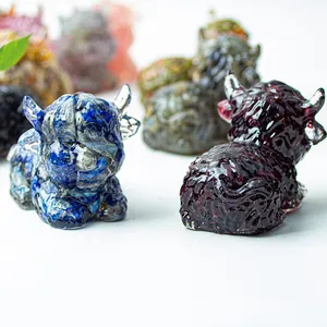 Macro shot of Highland Cow figurines made of resin and natural crystal with colorful textures