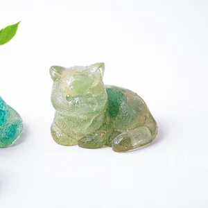 Detailed macro view of a green resin cat figurine with realistic fur textures and translucency
