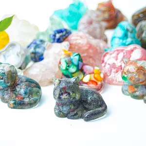 Macro detail of cute resin cat figurines with embedded natural crystal stone chips