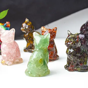 Detailed macro view of resin lucky cat figurines with natural crushed crystal stones