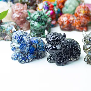 Detailed row of assorted crystal resin highland cow figurines in various natural stone colors