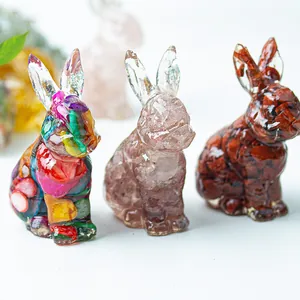 Detailed trio of resin crystal rabbit figurines in colorful, pink, and red-brown styles