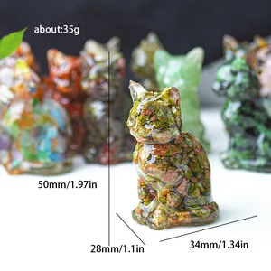 Lucky cat figurine made of resin with colorful natural stones and clear finish