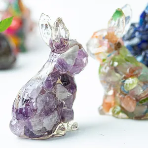 Macro detail of handmade resin rabbit figurine filled with purple amethyst crystals