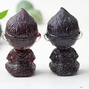 Detailed back view of two resin monkey king sculptures showing intricate hair texture