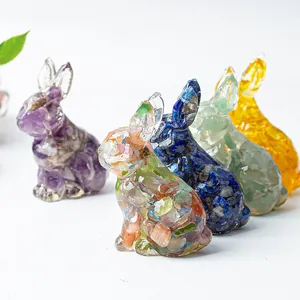 Detail of colorful resin rabbit figurines filled with various natural crystal stones