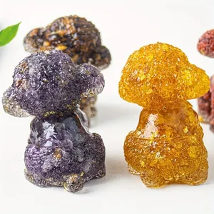 Macro shot of resin poodle figurines with natural crystals and gold foil details