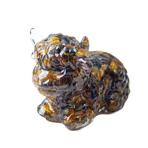 Resin highland cow figurine with embedded tiger eye stones for home and desk decor