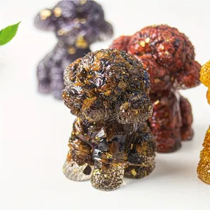 Macro detail of resin teddy dog figurines with embedded natural crystals and gold leaf
