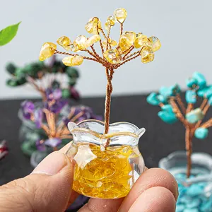 Miniature handmade citrine gemstone money tree in a glass jar for desktop decor