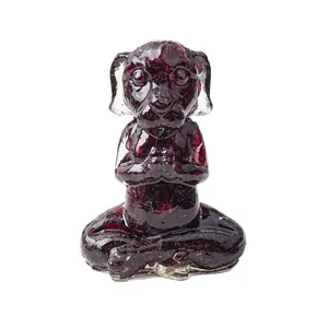 Meditating dog figurine crafted from translucent red crystal resin for zen home decor