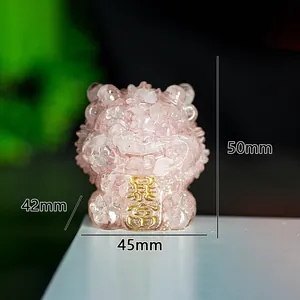 Pink resin crystal lion statue with golden prosperity engraving and compact 50mm size