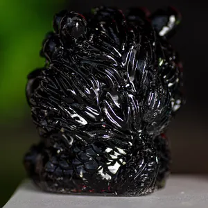 Polished black crystal resin Guardian Lion ornament with intricate scale textures