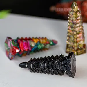 Detailed macro view of Wenchang Pagoda figurines in obsidian, fluorite, and green jade