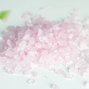Macro detail of natural rose quartz crushed stones for garden and plant decor