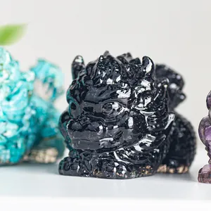 Macro shot of polished black resin kylin figurine with intricate traditional carvings
