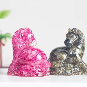 Detailed close-up of horse figurines with resin-filled natural crystal crushed stones