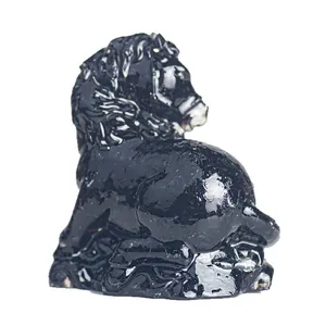 Glossy black horse statue made of resin and natural crystal for home decor